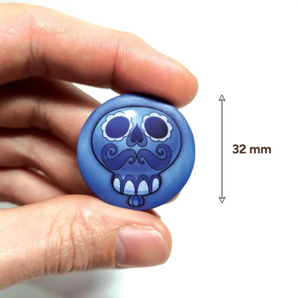 badge métal finition matte ballon bleu viva catrina