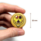 badge métal finition matte ballon jaune viva catrina